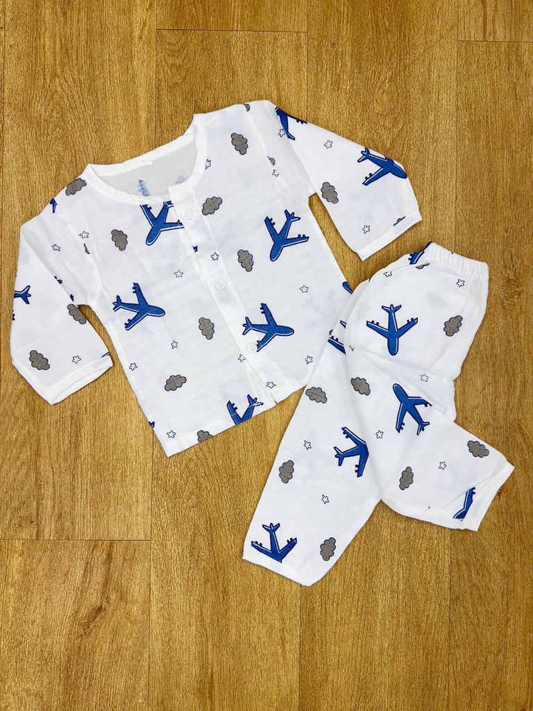 The item in the image is an organic muslin night suit for babies, likely from the brand "The Kutty Dreams".