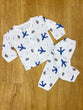 The item in the image is an organic muslin night suit for babies, likely from the brand "The Kutty Dreams".