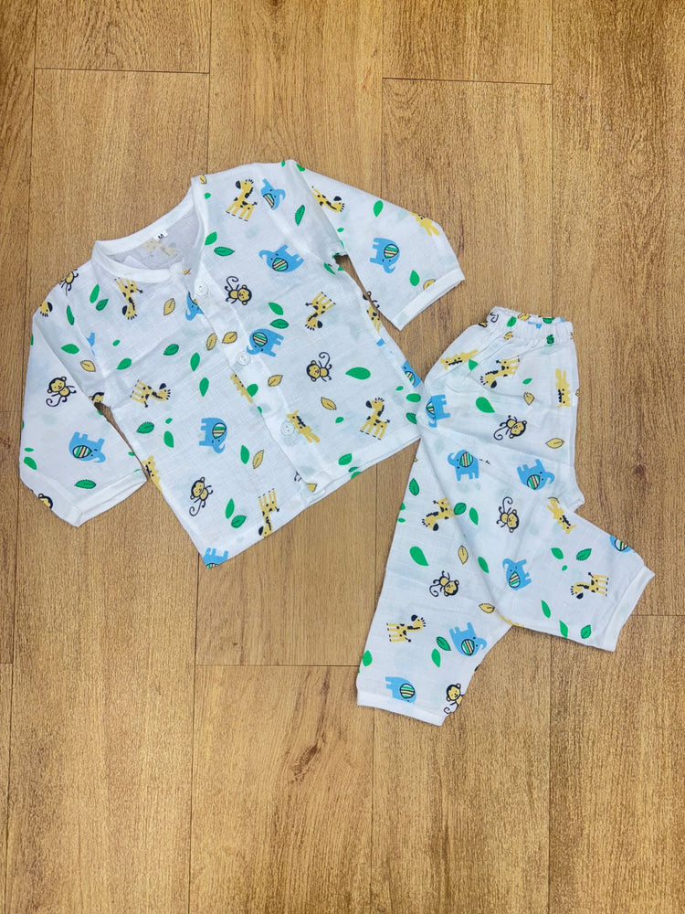 The image displays a white baby sleepsuit or pajama set, often described as a shirt and pant set or a night suit, with a colorful, all-over animal and leaf print.