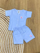 The item in the image is an (Magic train)Unisex Cotton Plain Baby Short Sleeves Suit & Short Pants. The small logo on both the shirt and shorts is a giraffe.