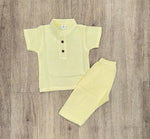 This image features is beige muslin co-ord set, consisting of a short-sleeve shirt and matching shorts.